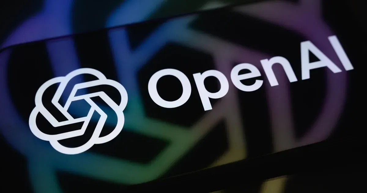 OpenAI logo and wordmark on a dark screen with blurred colorful reflections