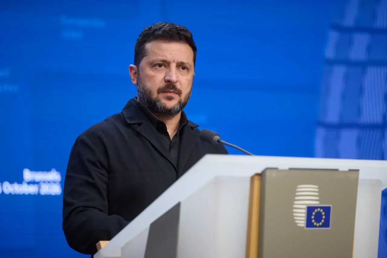 Bearded man in dark jacket speaking at a podium with EU emblem, blue backdrop.
