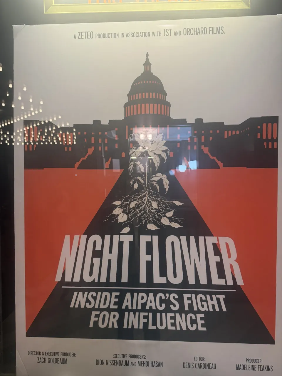 Night Flower documentary poster showing Capitol dome over red background with stylized flower and title text.