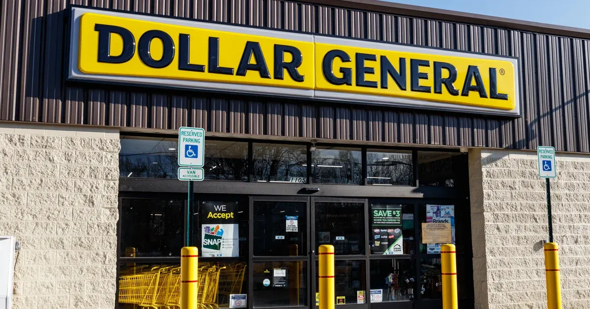 Exterior of a Dollar General store with its yellow sign and entrance.