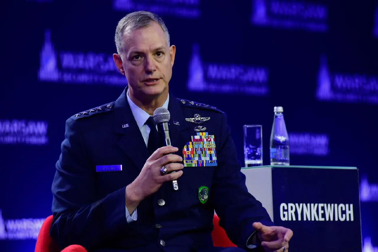 Uniformed military officer speaking into a microphone at a Warsaw Security Forum panel.