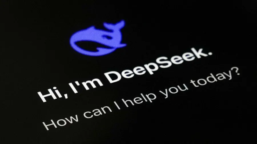 Photo of a screen showing DeepSeek's blue whale logo and greeting text